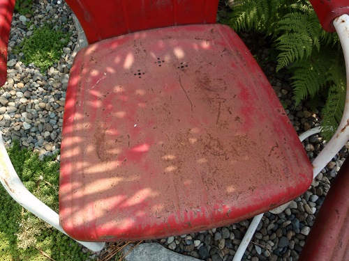 rusty metal chair seat