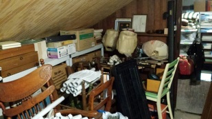 Furniture piled in attic