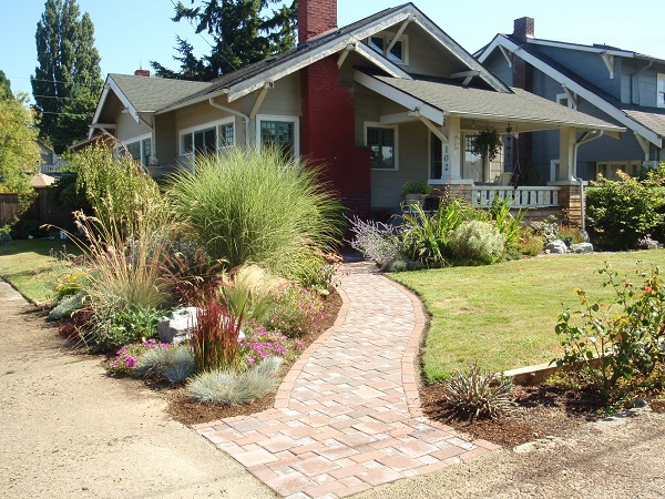 Craftsman bungalow and gardens in summer.